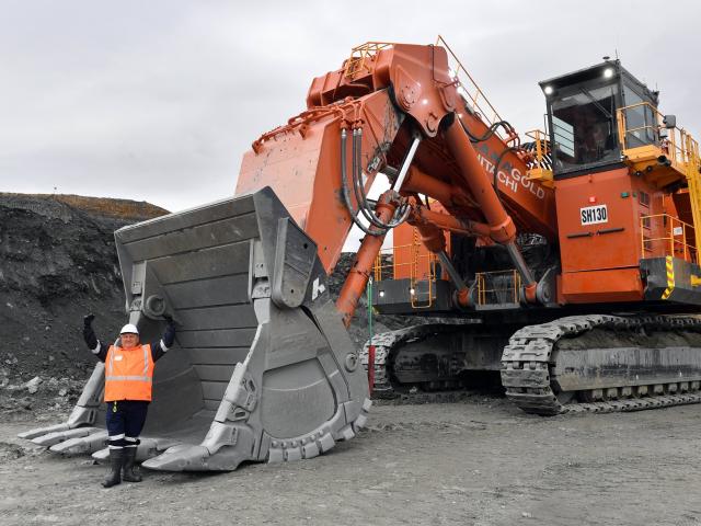 Resources Minister Shane Jones checks the bucket of Macraes' new&nbsp;electric shovel after...