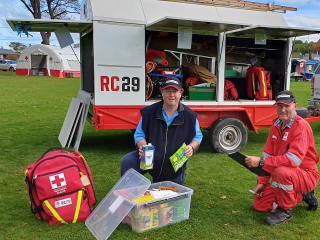 Gore disaster welfare support team members Bernard Chapman (left) and Alistair Robbie sort...