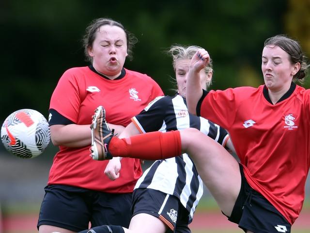 Competing for the ball are (from left) Madi Silcock (Roslyn), Kiera Bourgeois (Northern) and...