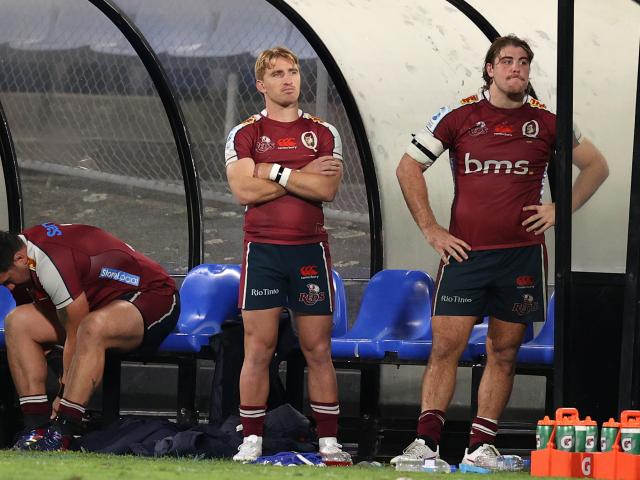 Queensland Reds players Fraser McReight (right) and Tate McDermott look on after being sent from...