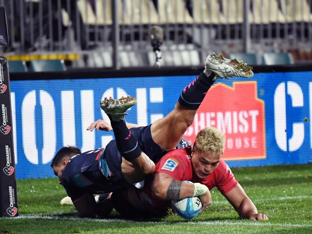 Christian Lio-Willie dives over to score one of his two tries in Christchurch tonight. Photo:...