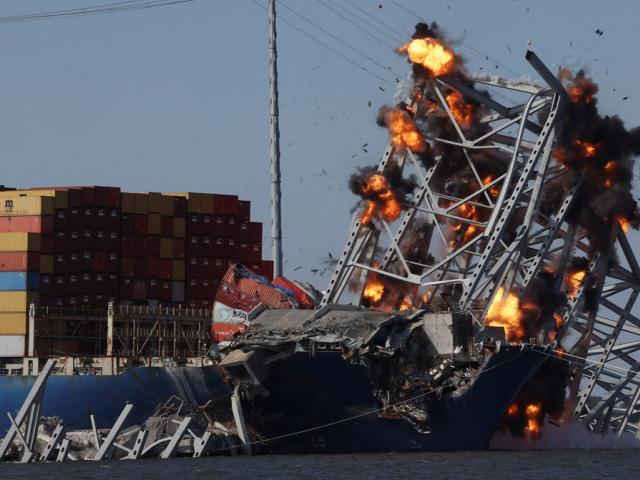 Explosives are detonated to free the container ship Dali after it was trapped following its crash...