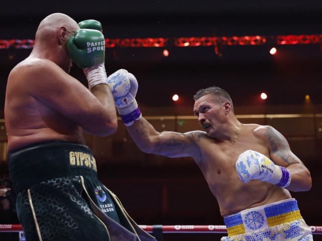 Oleksandr Usyk throws a right at Tyson Fury. Photo: Action Images via Reuters