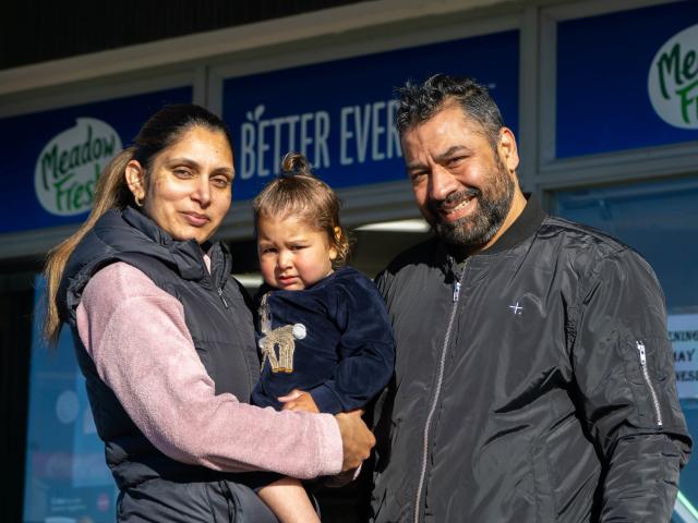 Thames Discounter and Takeaways owners Tania and Sunny Bal with daughter Grace, 2, outside the...