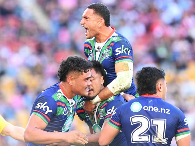 Warriors players celebrate a try during the NRL Round 11 match between the New Zealand Warriors...