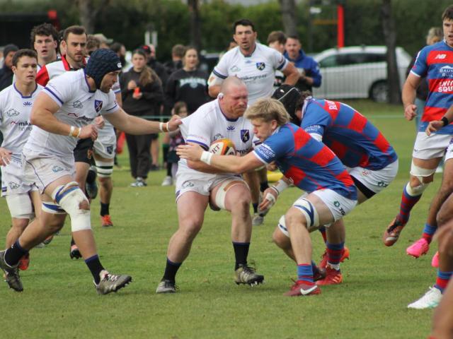 HSOB’s Josh Pitt carries the ball into contact against Sydenham in his side’s 20-19 win. PHOTO:...