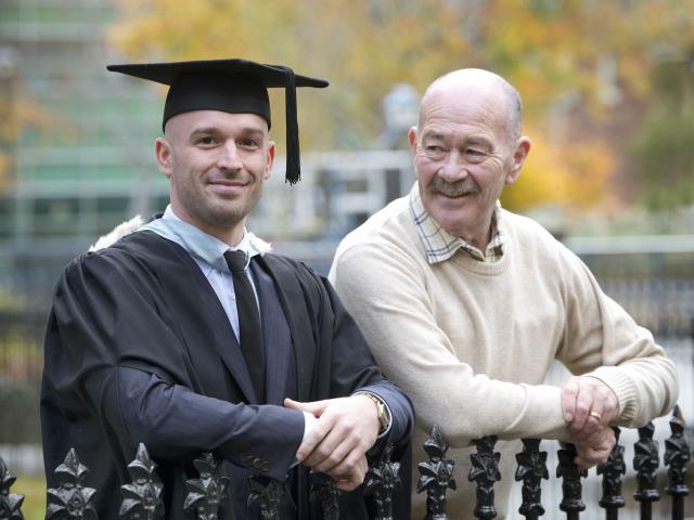 University of Otago law graduand James Inder with his father Craig, who also graduated from Otago...