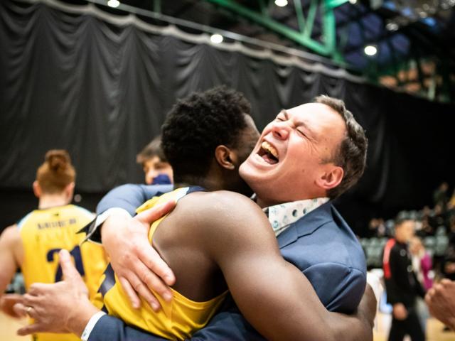 Otago Nuggets coach Brent Matehaere celebrates with shooting guard Keith Williams after the...