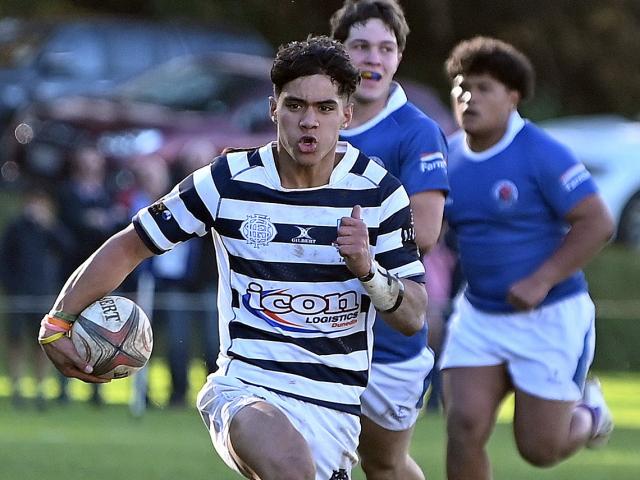 Otago Boys’ winger Manaia Lesa races away from the Southland Boys’ defence during the First XV...