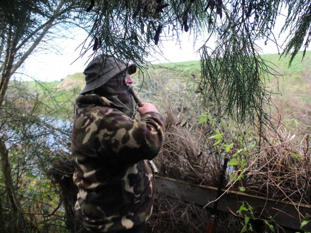 Bleating out a call for ducks in the Mokotua area is Invercargill man Phil Peek. PHOTOS: NINA TAPU