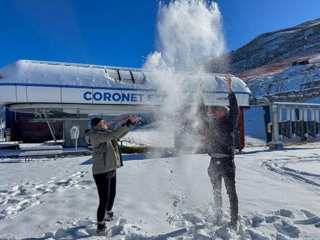 Marcella Collins and Graham Jenkins, of Queenstown, make the most of the fresh snow at Coronet...
