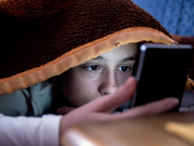 There are fears about teens staying up all night using their phones and being tired and...