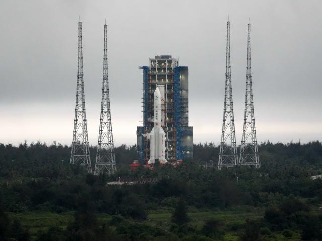China's Chang'e-6 lunar mission rocket prepares to lift off from the Wenchang Satellite Launch...