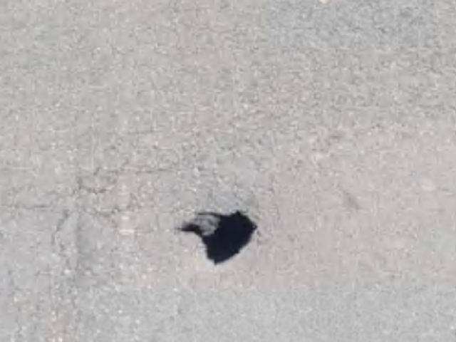 The small sinkhole recently appeared in the middle of Halifax Street East. Photo: Supplied / John...
