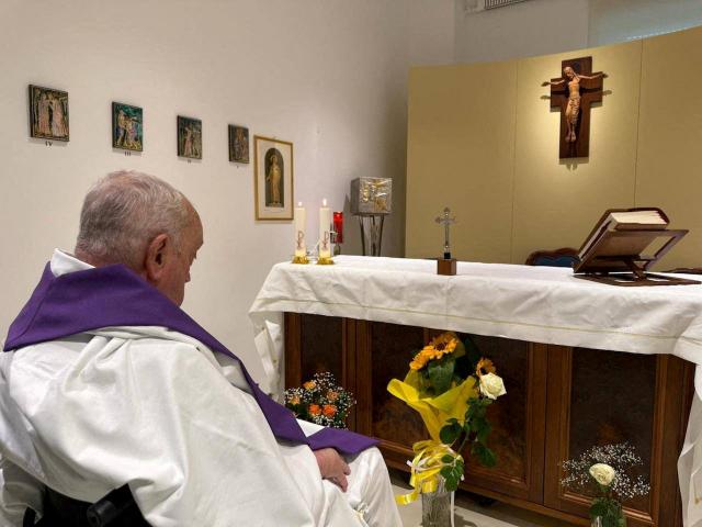 Pope Francis in the chapel of the Gemelli hospital in Rome in this photo released by the Vatican...
