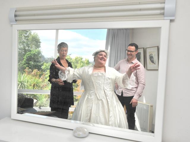 Costume maker Charmian Smith, Mezzo-soprano Claire Barton and director James Adams at a fitting...