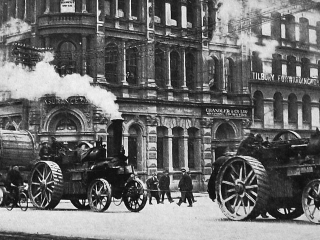 Steam traction engines haul a drum of replacement cable up Rattray St to the Roslyn cable car...