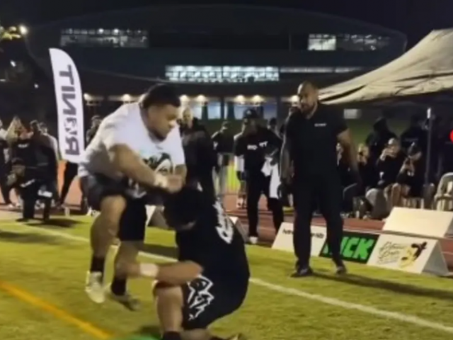 Two men collide during a Run it Straight sporting event in Auckland. Photo: Supplied / RUNIT...