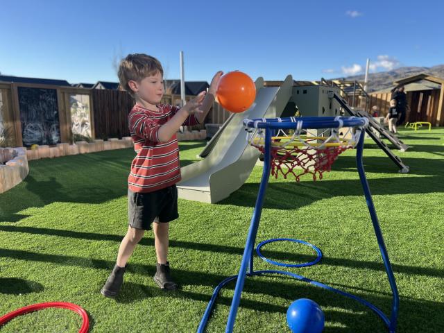 Tyson Browne makes use of the outdoor play space at a new purpose-built early childhood centre in...