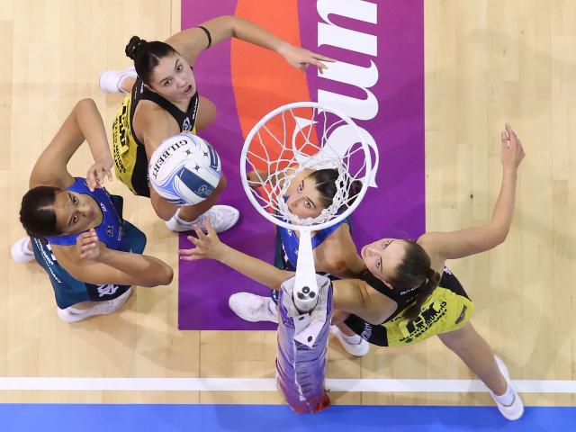Southern Steel shooter Aliyah Dunn (left) puts up her shot as Central Pulse defender Parris Mason...