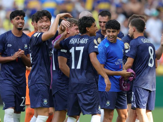 Auckland City players celebrate after the match. Photo: Reuters