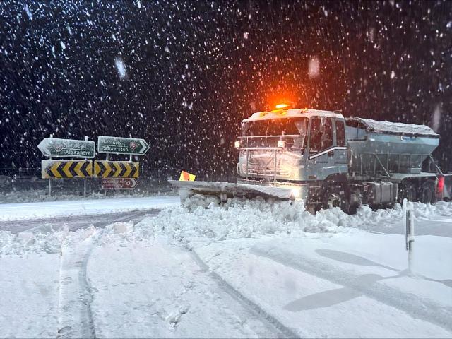 Central Otago District Council crews work to clear roads at Kyeburn affected by heavy snow in the...