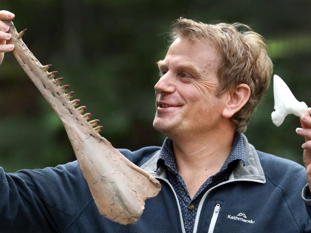 University of Otago visiting academic Dr Daniel Thomas, of Auckland, holds a 3-Dprinted ancient...