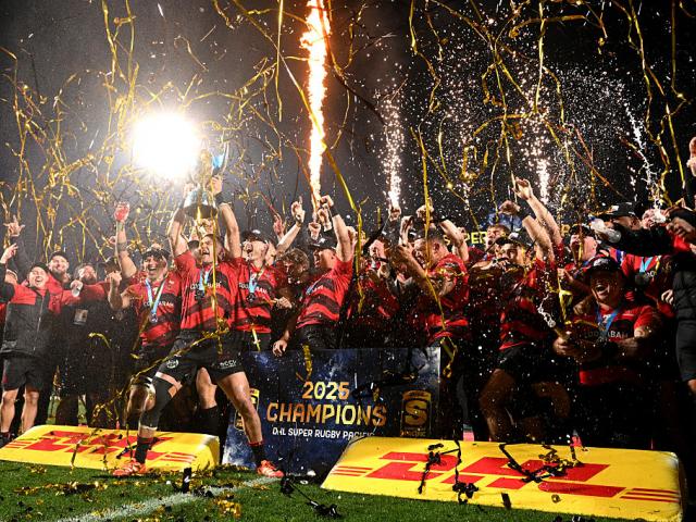 The Crusaders celebrate their victory in the Super Rugby Pacific final at Apollo Projects Stadium...