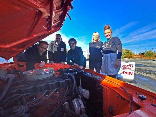 Mocketts Motors owner Chris Gudsell (left), automotive engineering apprentice Marco Shepherd,...