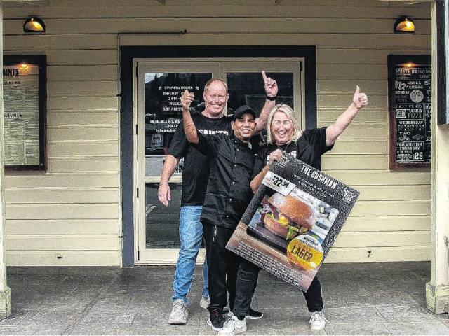 JJ Sandall, Mel Elliot, and head chef Yash Rawat celebrate their Bushman burger being selected as...