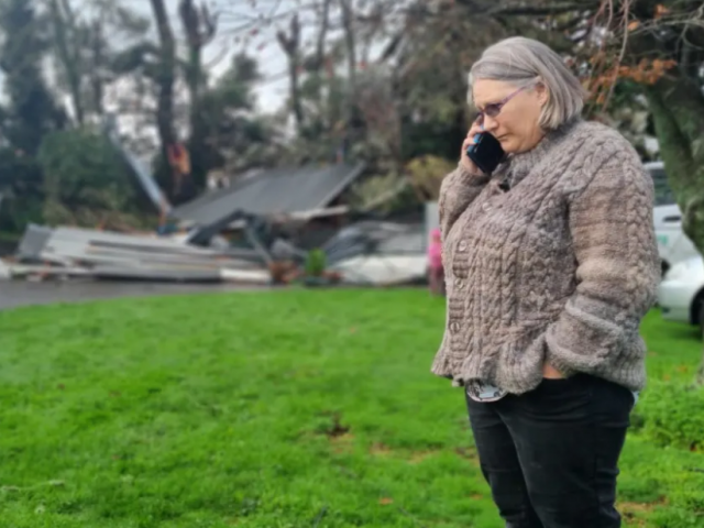 Shirlene Patterson's 100-year-old villa in Tuiti St had much of its roof ripped off. Photo: RNZ 
