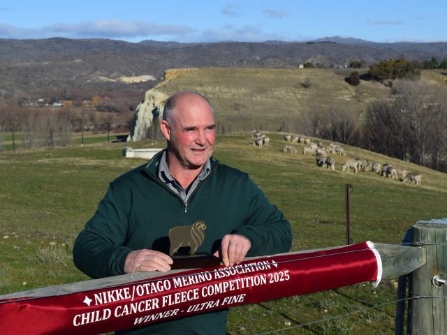 Ithiel owner John Waldron celebrates winning the ultra-fine section of the 2025 Otago Merino...
