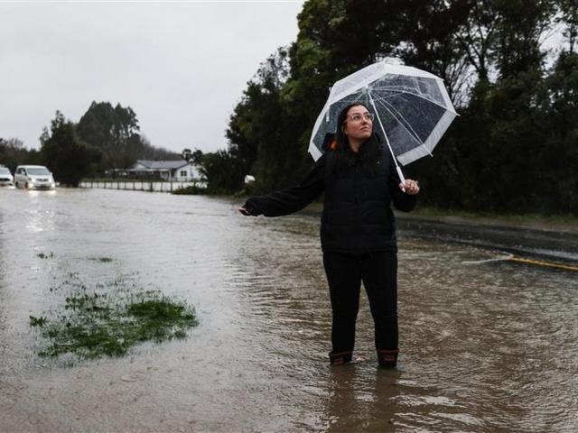 Alex Croy lives in Wakefield and in one hour saw floodwaters cover SH6 out the front of her house...