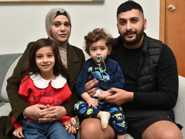 Gazan woman Sabreen Alsaadoni and husband Emad Ismail relax in their Belleknowes home with their...
