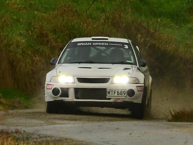 Caleb MacDonald and Larisa Biggar, in a Mitsubishi Lancer EVO 6, scream down the road at the 2025...