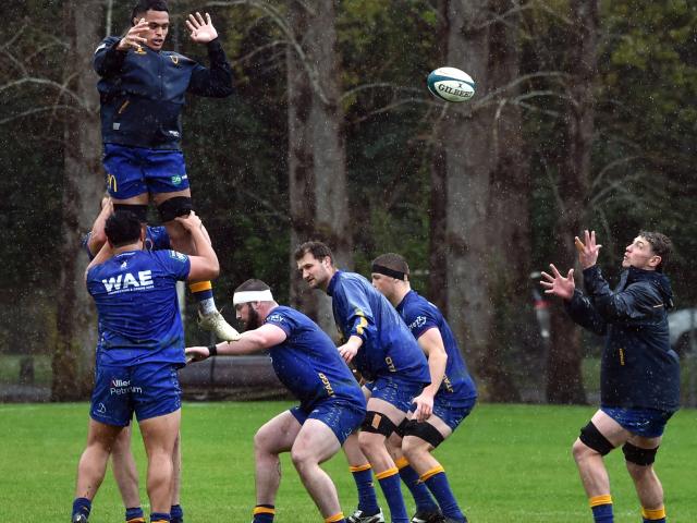 All Blacks XV No 8 Christian Lio-Willie is lifted in a lineout during an Otago training session...