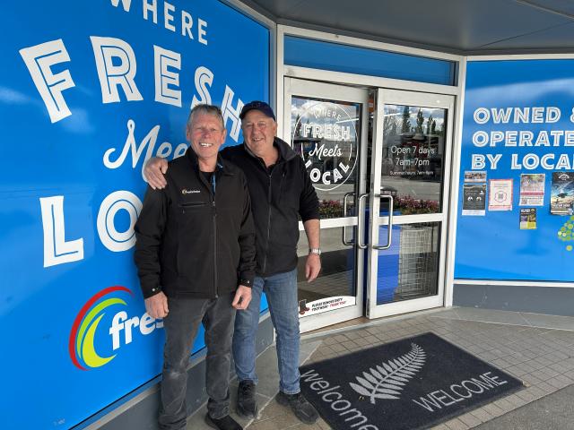 Roxburgh Supermaket owners Ian Cahill, left, and Chris Toms celebrate the sale of the business...