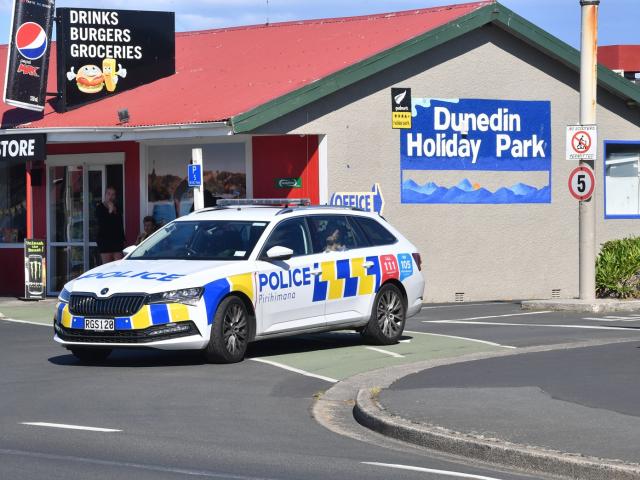 A police car leaves the Dunedin Holiday Park after an arrest was made over an alleged disorder...
