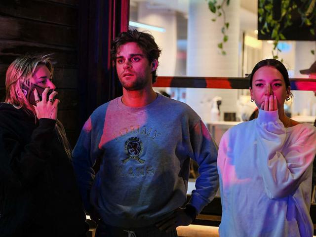 Members of the public watch in distress after a mass shooting last night at Bondi Beach in which...