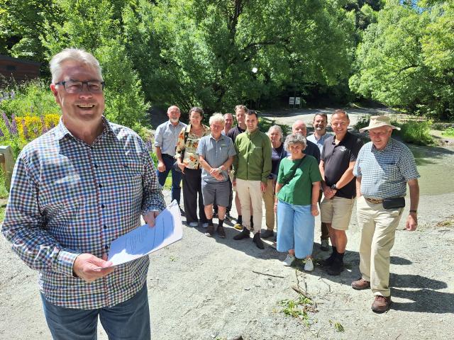 Kevin Marlow with the group of stakeholders who signed an MOU late last year. PHOTO: GUY WILLIAMS