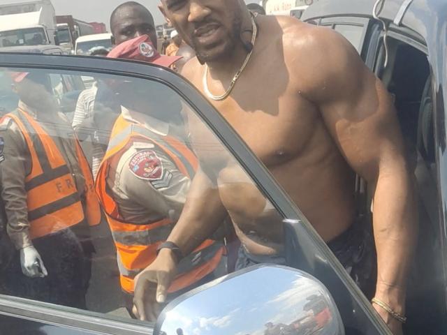 Anthony Joshua gets into an emergency responders' vehicle after being involved in a car crash....