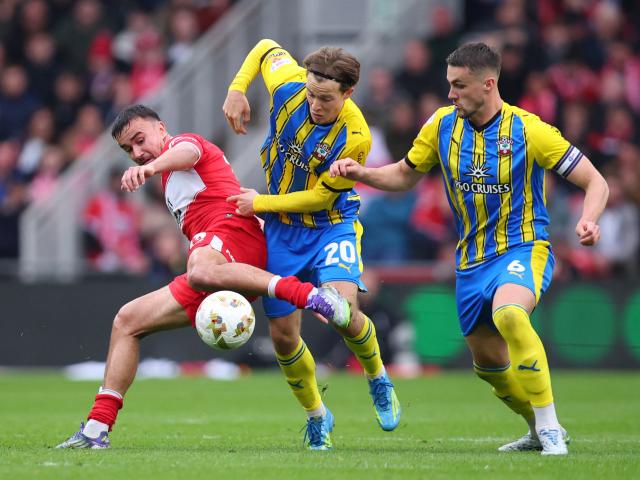 Middlesbrough's David Strelec in action with Southampton's Caspar Jander and Taylor Harwood...