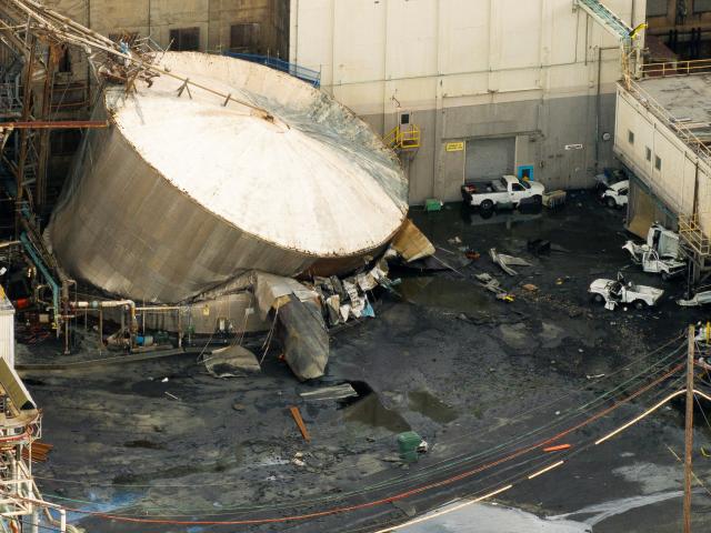 The ruptured chemical tank at the Nippon Dynawave Packaging pulp and paper mill in Longview,...