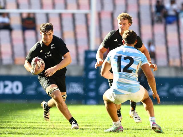 Finn McLeod takes the ball into contact for New Zealand against Argentina in the under 20 Rugby...