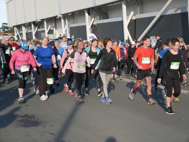 And they're off . . . Half marathon walkers set off at the start of the Dunedin Marathon, held in...