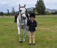 Lucy Lake (5), of Omakau, leads her horse Moonbug at the Otago Taieri A&P Show in Mosgiel. PHOTOS...