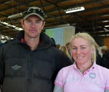 Earnscleugh Station owners Duncan and Amanda Campbell in their woolshed at their 37th annual bull...