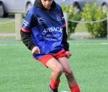Gabriel McCone on the the ball during South Otago High School’s football match at Logan Park Turf...