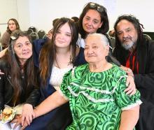 Graduate Taniya McBride (18, second from left) with grandmother Shirlene Tahiri, mother Ashley...