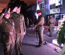 Army Captain Arno Bekker and Lance Corporal Dylan Fisher laid a wreath at the dawn service on...